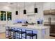 Spacious kitchen with white cabinets, marble island, and stainless steel appliances at 5430 E Calle Redonda --, Phoenix, AZ 85018