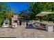 Outdoor kitchen with pizza oven, grill, and bar at 5430 E Calle Redonda --, Phoenix, AZ 85018