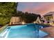 Inviting swimming pool with a waterfall feature and lounge area at 5430 E Calle Redonda --, Phoenix, AZ 85018
