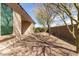 Landscaped backyard with stone pathway at 5575 W Cinder Brook Way, Florence, AZ 85132