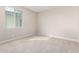 Simple bedroom with neutral wall and carpet at 5575 W Cinder Brook Way, Florence, AZ 85132