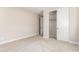 Well-lit bedroom with closet and neutral tones at 5575 W Cinder Brook Way, Florence, AZ 85132