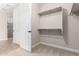 Walk-in closet with double doors and shelving at 5575 W Cinder Brook Way, Florence, AZ 85132