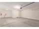 Spacious garage with extra storage and door at 5575 W Cinder Brook Way, Florence, AZ 85132