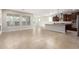 Modern kitchen with dark cabinetry and an island at 5575 W Cinder Brook Way, Florence, AZ 85132
