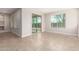 Bright living room with sliding door to backyard at 5575 W Cinder Brook Way, Florence, AZ 85132