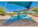 Resort-style pool with a ' water play area at 5575 W Cinder Brook Way, Florence, AZ 85132