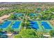 Aerial view of community tennis courts at 5575 W Cinder Brook Way, Florence, AZ 85132