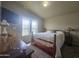 Main bedroom with a queen bed and plenty of natural light at 650 N Hawes Rd # 2713, Mesa, AZ 85207