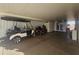 Carport with golf cart and motorcycle storage at 650 N Hawes Rd # 2713, Mesa, AZ 85207