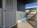 Relaxing covered patio with seating and a view at 650 N Hawes Rd # 2713, Mesa, AZ 85207