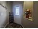 Inviting entryway with decorative accents and a coat rack at 650 N Hawes Rd # 2713, Mesa, AZ 85207