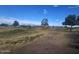 Scenic view of a golf course with rolling hills and clear blue skies at 650 N Hawes Rd # 2713, Mesa, AZ 85207