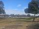 Golfers enjoying a sunny day on the course at 650 N Hawes Rd # 2713, Mesa, AZ 85207