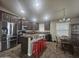 Spacious kitchen with island, stainless steel appliances, and granite countertops at 650 N Hawes Rd # 2713, Mesa, AZ 85207