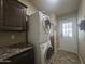 Convenient laundry room with stacked washer and dryer at 650 N Hawes Rd # 2713, Mesa, AZ 85207