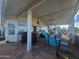 Large covered patio with seating area and bar at 650 N Hawes Rd # 2713, Mesa, AZ 85207