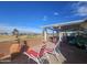 Peaceful patio with lounge chairs and a fountain at 650 N Hawes Rd # 2713, Mesa, AZ 85207