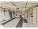 Two-car garage with washer, dryer, and extra storage cabinets at 663 S Saguaro Way, Mesa, AZ 85208