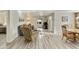 Bright living room with hardwood floors, comfortable seating, and access to a patio at 663 S Saguaro Way, Mesa, AZ 85208