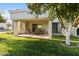 Covered patio with outdoor seating and a grill at 663 S Saguaro Way, Mesa, AZ 85208