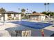 Community pool with a covered patio and spa at 663 S Saguaro Way, Mesa, AZ 85208