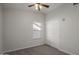 Cozy bedroom with double door closet and window at 6644 E Snowdon Cir, Mesa, AZ 85215