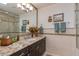 Updated bathroom with granite countertop and tiled shower at 7325 E El Caminito Dr, Scottsdale, AZ 85258