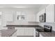 Well-equipped kitchen features granite counters and stainless steel appliances at 8470 W Mantle Way, Florence, AZ 85132