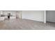 Spacious living room with tile flooring, and natural light at 8470 W Mantle Way, Florence, AZ 85132
