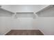 Walk-in closet features carpet, and shelving units at 8470 W Mantle Way, Florence, AZ 85132