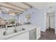 Well-lit kitchen featuring white cabinets, stainless steel appliances, and quartz countertops at 10050 E Mountainview Lake Dr # 39, Scottsdale, AZ 85258