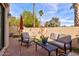 Cozy outdoor patio featuring comfortable seating and a tranquil garden view, perfect for relaxing afternoons at 10050 E Mountainview Lake Dr # 39, Scottsdale, AZ 85258