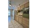 View of kitchen appliances and cabinetry at 10437 W Caron Dr, Sun City, AZ 85351