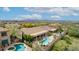 Aerial view of house, pool, and surrounding landscape at 10788 E Raintree Dr, Scottsdale, AZ 85255