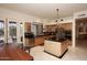 Modern kitchen featuring stainless steel appliances and an island at 10788 E Raintree Dr, Scottsdale, AZ 85255