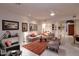 Bright living room with fireplace and built in shelving at 10788 E Raintree Dr, Scottsdale, AZ 85255