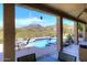 Relaxing pool with mountain views and patio access at 10788 E Raintree Dr, Scottsdale, AZ 85255