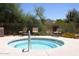 Relax in this community hot tub with mountain views at 10788 E Raintree Dr, Scottsdale, AZ 85255