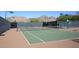 Enjoy a game on this well-maintained tennis court at 10788 E Raintree Dr, Scottsdale, AZ 85255