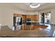 Kitchen featuring granite countertops, stainless steel appliances, and wood cabinets at 11222 E Oberlin Way, Scottsdale, AZ 85262