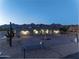 Beautiful home with desert landscaping, circular driveway and mountain views at 12560 E Cochise Dr, Scottsdale, AZ 85259