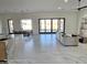 Open living area featuring sleek marble floors and lots of natural light at 12560 E Cochise Dr, Scottsdale, AZ 85259