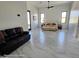 Spacious main bedroom with sleek floors and lots of natural light at 12560 E Cochise Dr, Scottsdale, AZ 85259