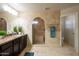 Elegant bathroom with double sinks, a large shower, and tile flooring at 1278 E Geona Ct, San Tan Valley, AZ 85140