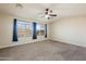 Spacious bedroom with ceiling fan and window at 1278 E Geona Ct, San Tan Valley, AZ 85140