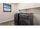 Laundry room with modern washer and dryer set at 1278 E Geona Ct, San Tan Valley, AZ 85140