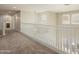 Bright hallway with white railings and carpet at 1278 E Geona Ct, San Tan Valley, AZ 85140