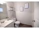 Clean and modern half bathroom with a toilet and sink at 1425 S Lindsay Rd # 20, Mesa, AZ 85204