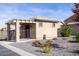 Community building with gated entrance, pergola, and landscaping at 1425 S Lindsay Rd # 20, Mesa, AZ 85204